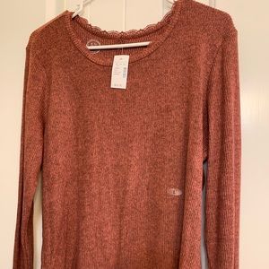 Size large rose colored shirt NWT